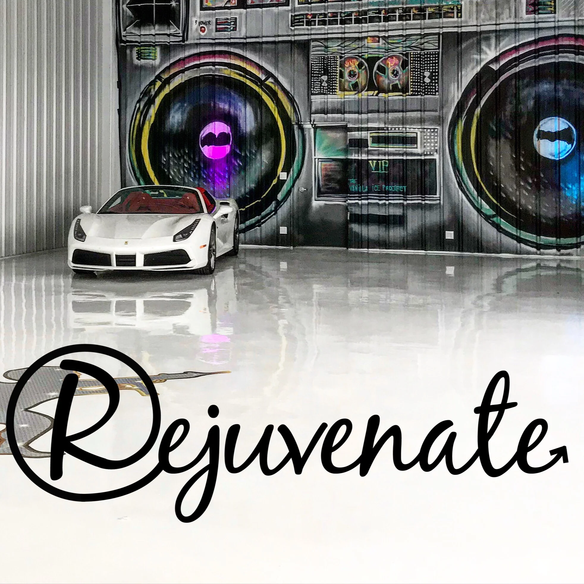 Sports car parked on a white epoxy floor with the Rejuvenate Flooring logo over it.
