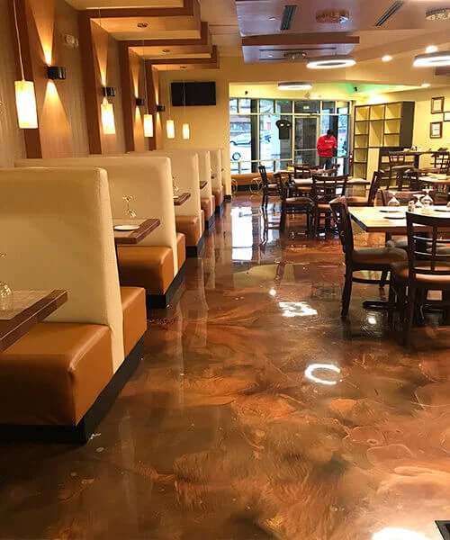 Brown epoxy flooring coating in a restaurant.